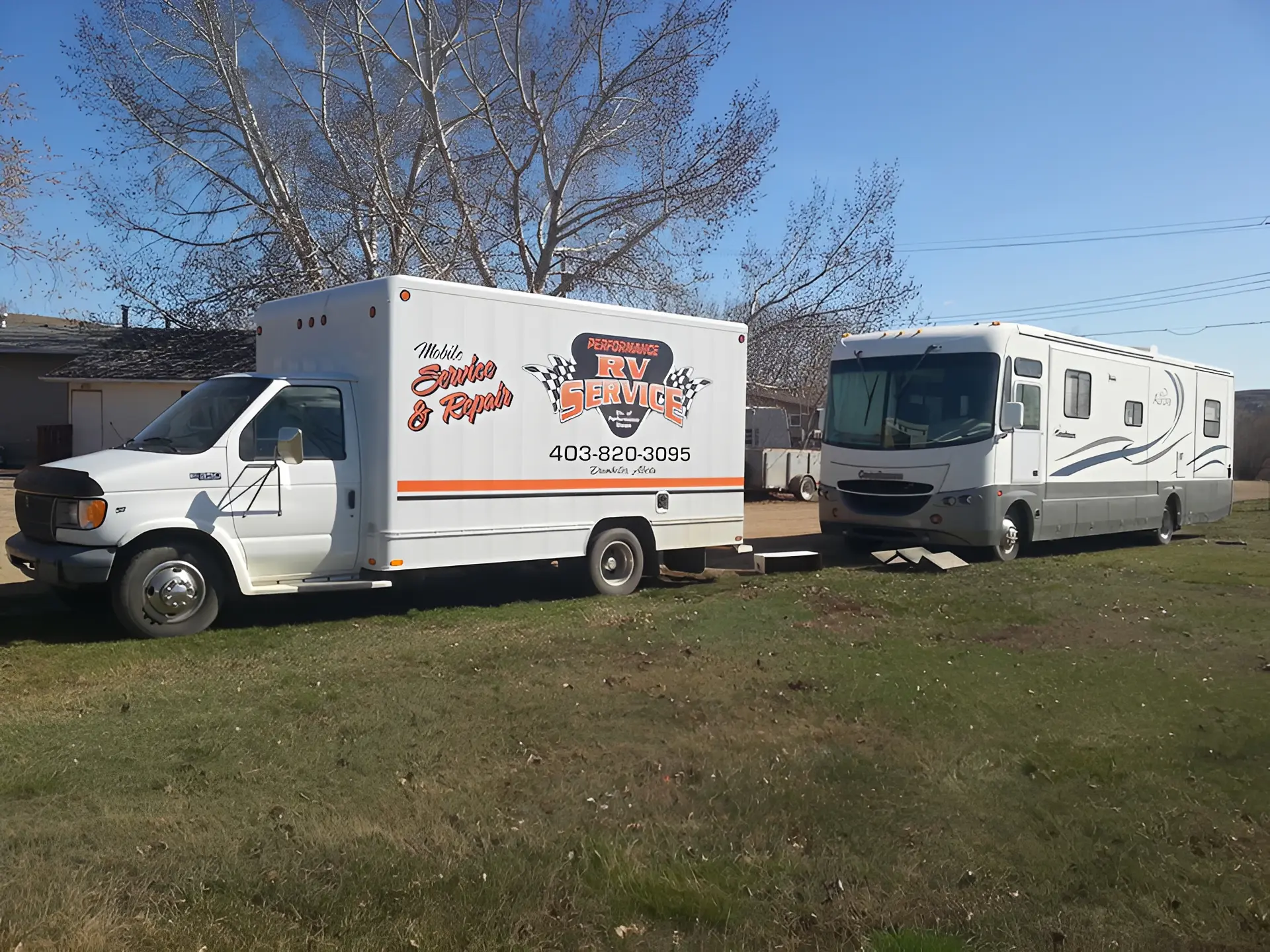 Mobile repair truck beside motorhome
